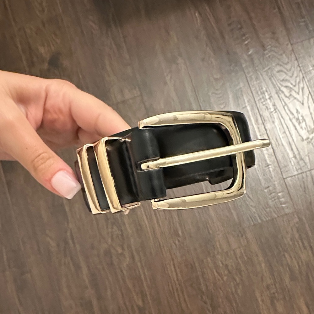 Leather belt with gold buckle